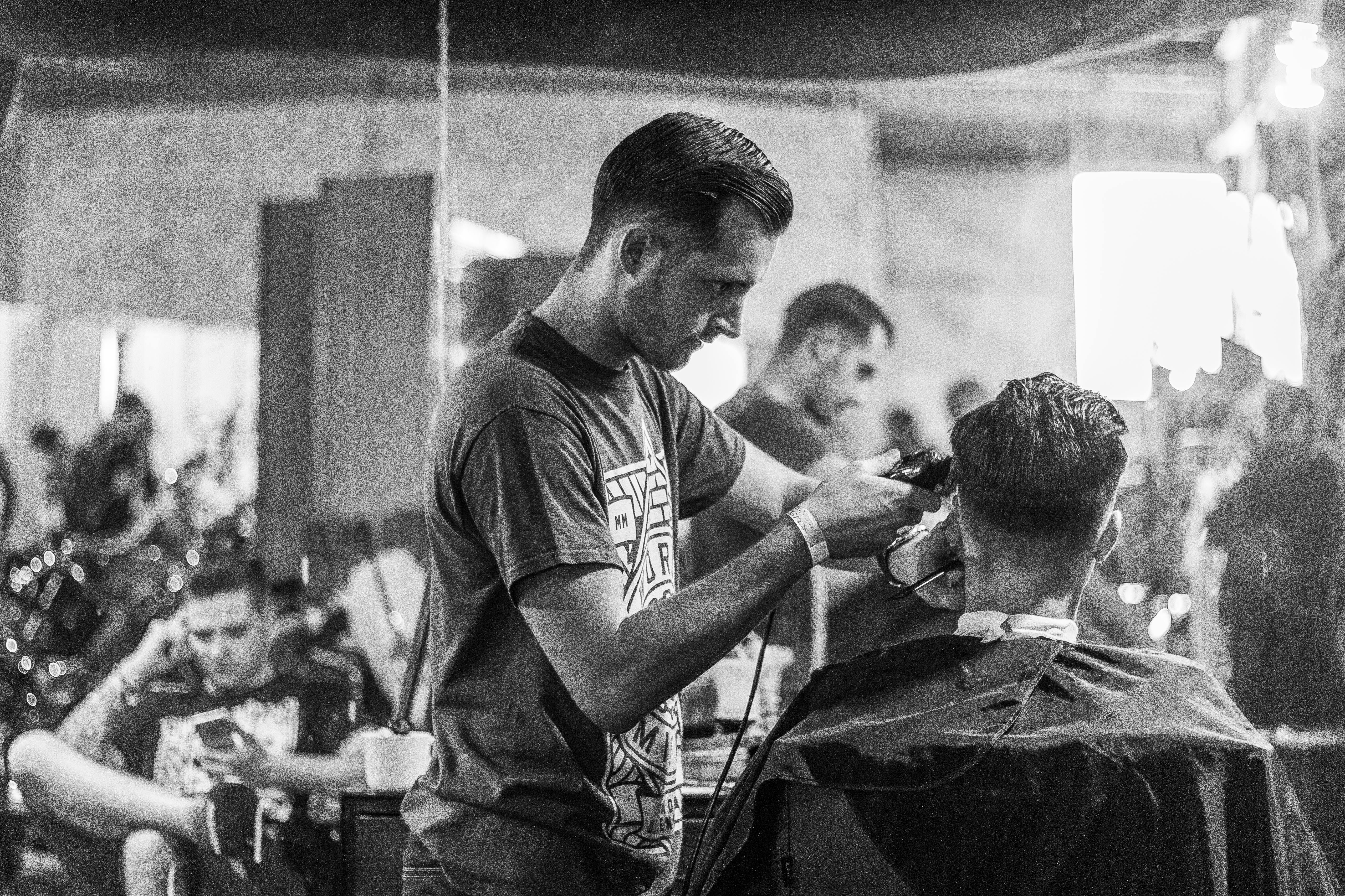 Barber cutting hair